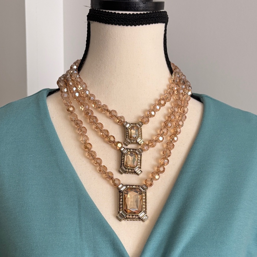 Heidi Daus Elegant Gold-Tone Crystal Statement Necklace - Triple Strand